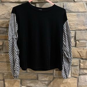 Black sweater with  B & W, puffy gingham sleeves